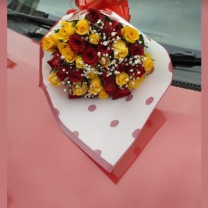 Yellow red roses with gerbera