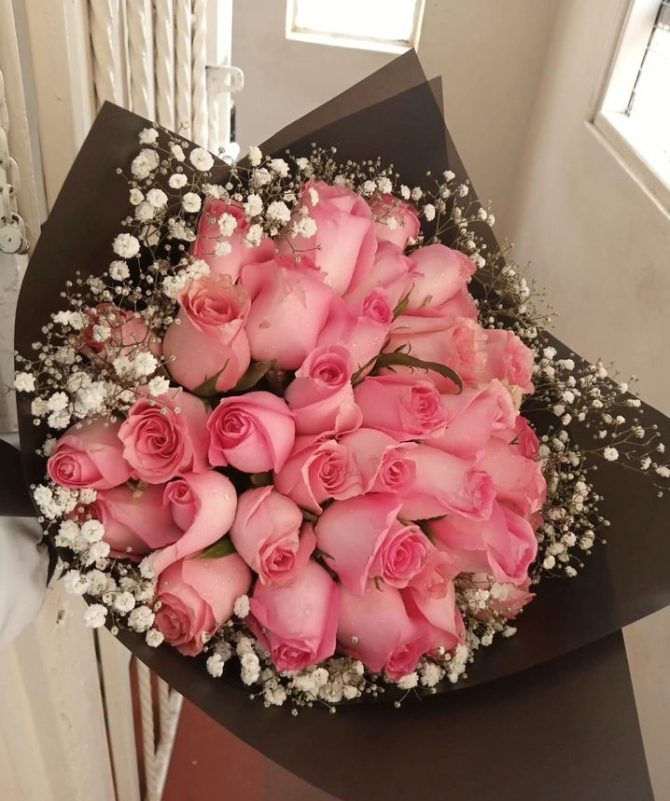 Pink roses with baby breath