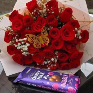 Red roses chocolate and butterflies