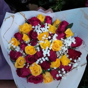 Red yellow roses and baby breath